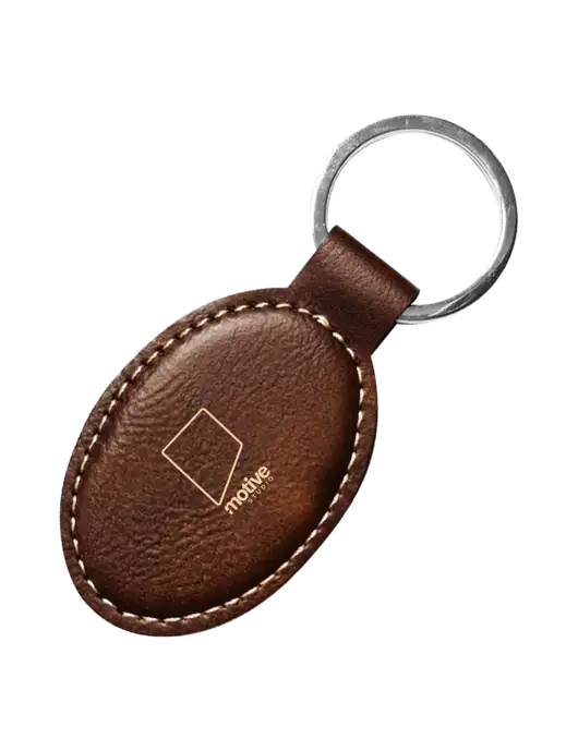 Rustic Leatherette Oval Keychain w/Motive Studio Logo