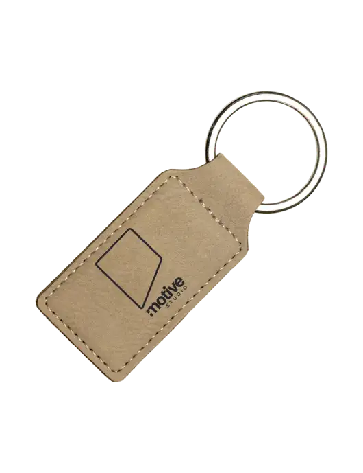 Tan Laserable Leatherette Rectangle Keychain w/Motive Studio Logo